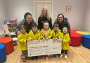 Youngsters from Auchinleck Nursery handed over a cheque