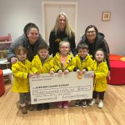 Youngsters from Auchinleck Nursery handed over a cheque